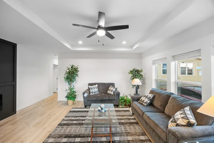 The LULAMAE 3 Living Room. This Manufactured Mobile Home features 3 bedrooms and 2 baths.