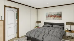 The SPIRIT Primary Bedroom. This Manufactured Mobile Home features 2 bedrooms and 2 baths.