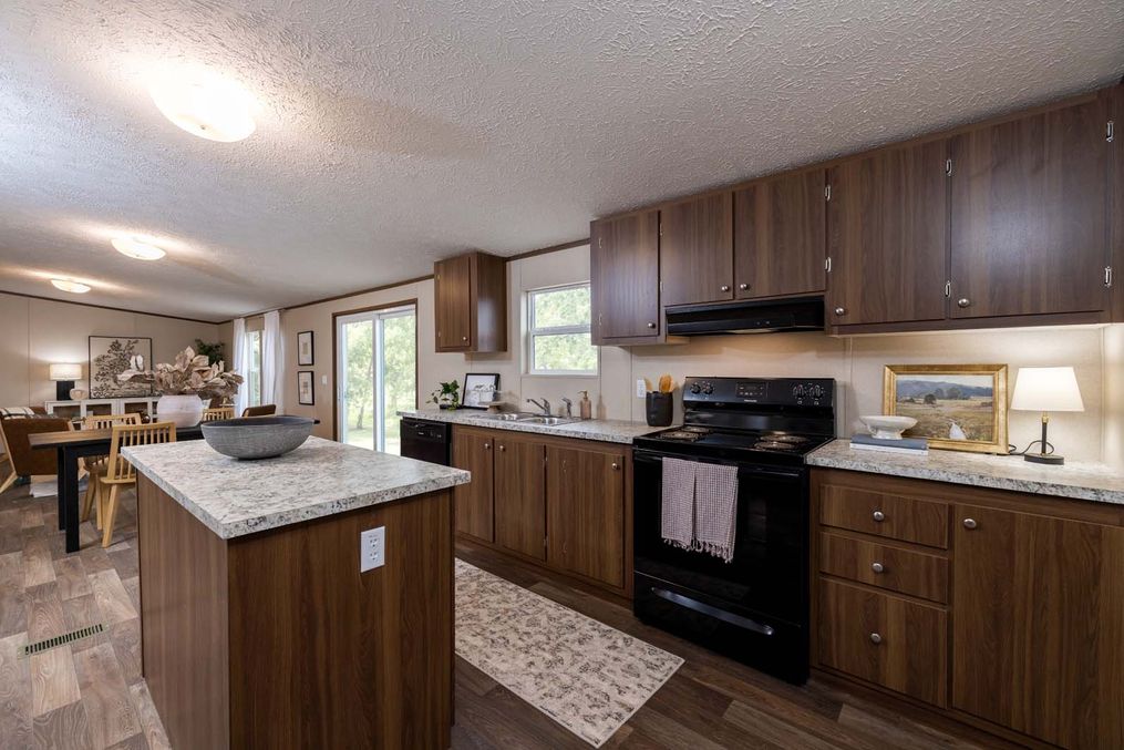 The PRIDE Kitchen. This Manufactured Mobile Home features 4 bedrooms and 2 baths.