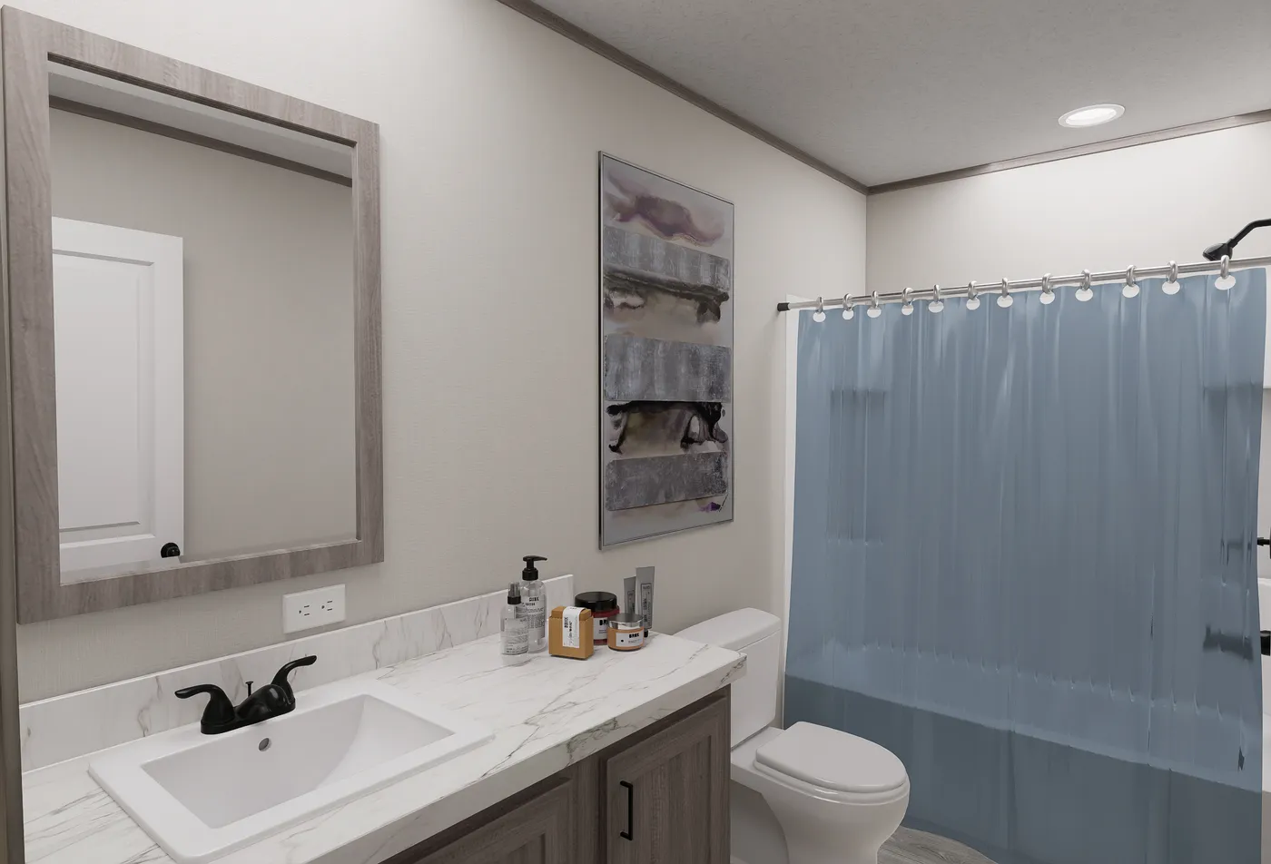 The DIAMOND Guest Bathroom. This Manufactured Mobile Home features 3 bedrooms and 2 baths.