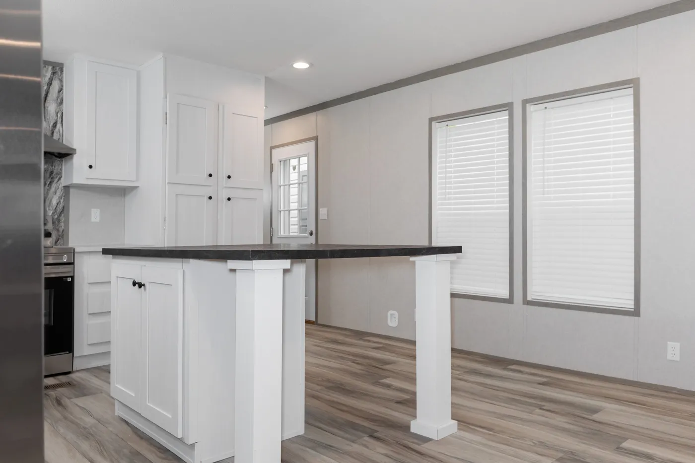 The THE PANTRY HOUSE Kitchen. This Manufactured Mobile Home features 3 bedrooms and 2 baths.
