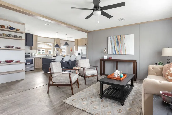The STERLING XL ANNIVERSARY Living Room. This Manufactured Mobile Home features 3 bedrooms and 2 baths.