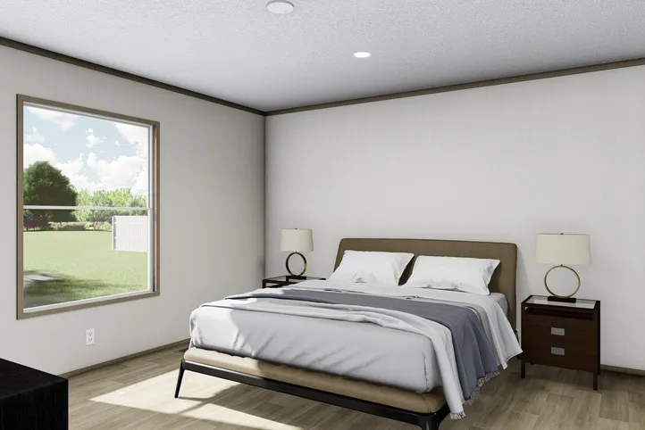 The BOONE Primary Bedroom. This Manufactured Mobile Home features 4 bedrooms and 2 baths.