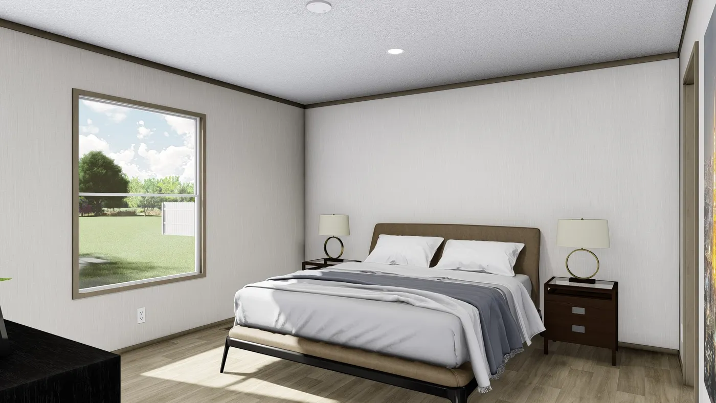 The BOONE Primary Bedroom. This Manufactured Mobile Home features 4 bedrooms and 2 baths.