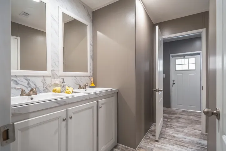 The CASCADE Guest Bathroom. This Home features 4 bedrooms and 2 baths.
