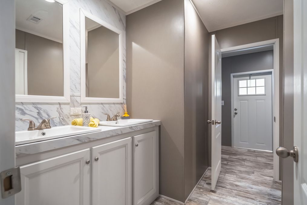 The CASCADE Guest Bathroom. This Home features 4 bedrooms and 2 baths.