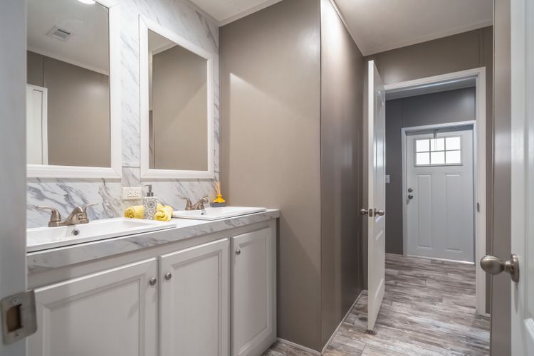 The CASCADE Guest Bathroom. This Home features 4 bedrooms and 2 baths.