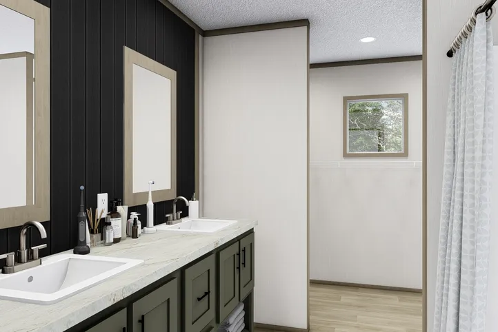The BOONE Primary Bathroom. This Manufactured Mobile Home features 4 bedrooms and 2 baths.
