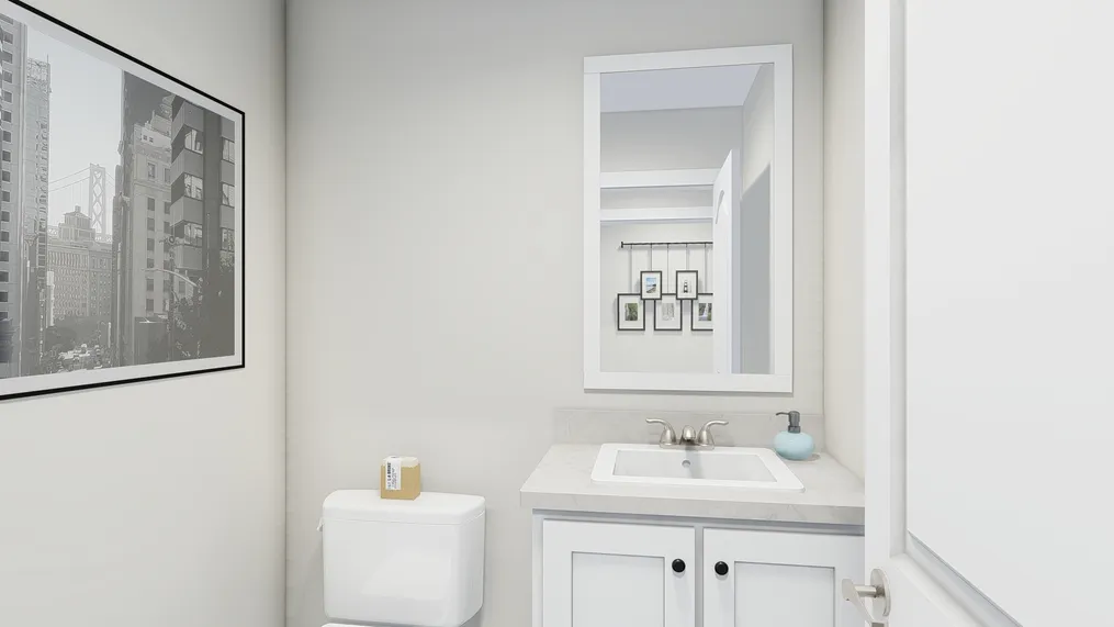 The COUNTRY AIRE Guest Bathroom. This Manufactured Mobile Home features 3 bedrooms and 3 baths.