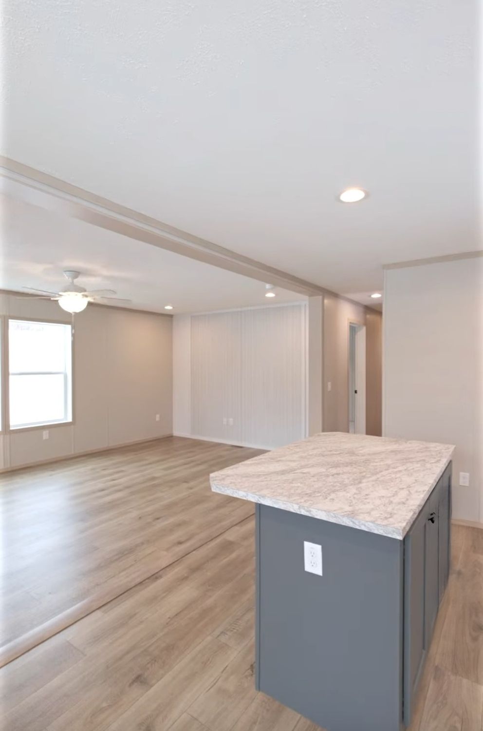 The TURQUOISE Living Room. This Manufactured Mobile Home features 2 bedrooms and 2 baths.