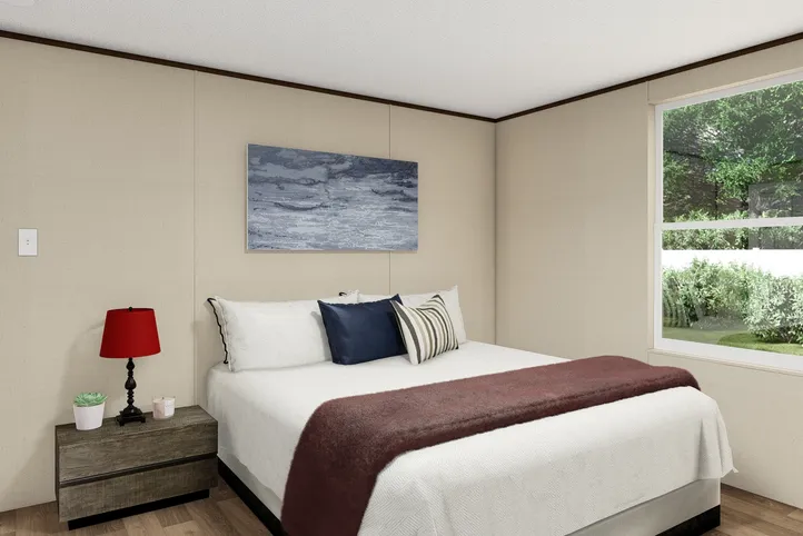 The TRIUMPH Bedroom. This Manufactured Mobile Home features 5 bedrooms and 3 baths.