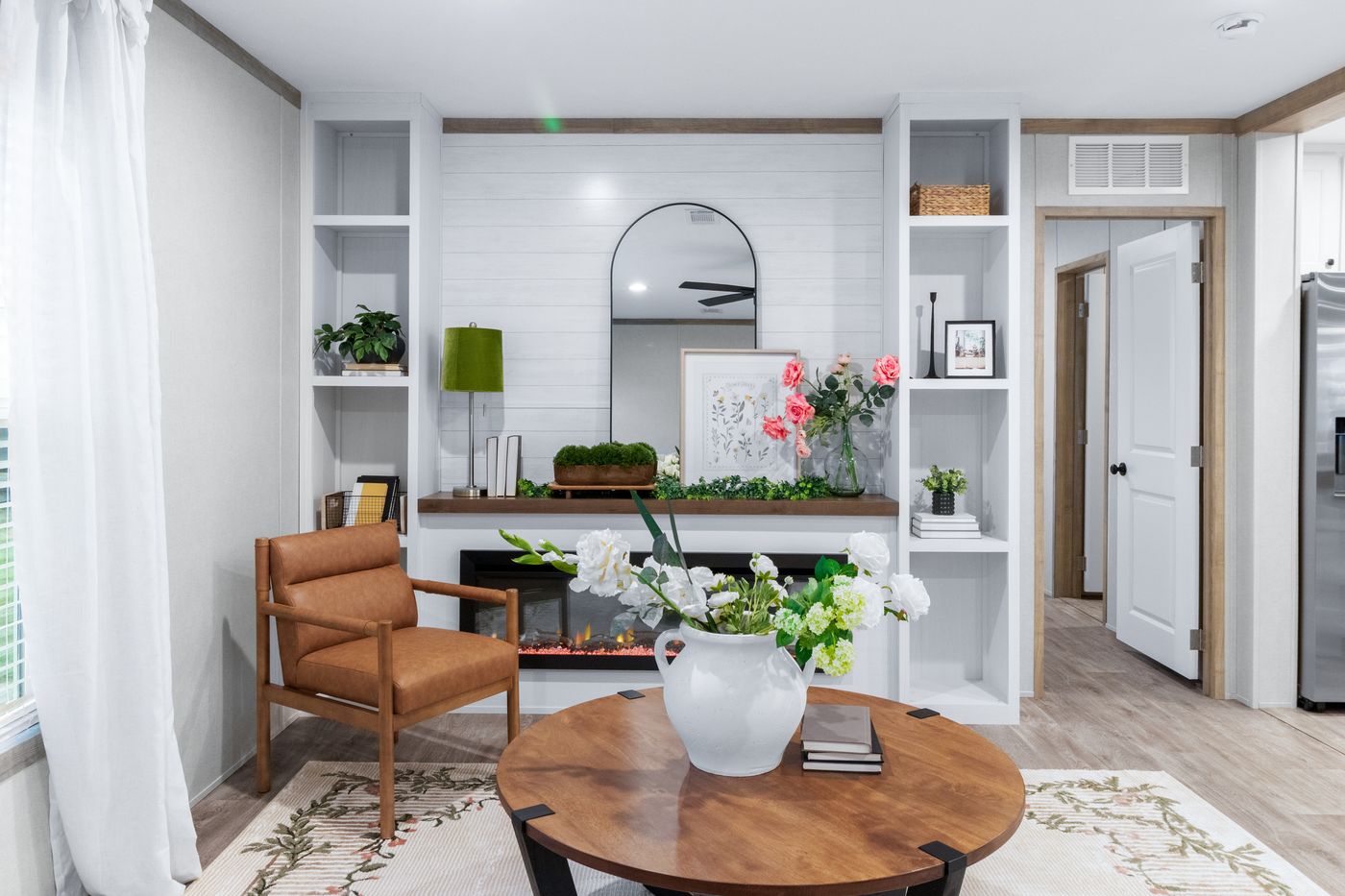 The EL SUENO BREEZE Living Room. This Manufactured Mobile Home features 4 bedrooms and 2 baths.