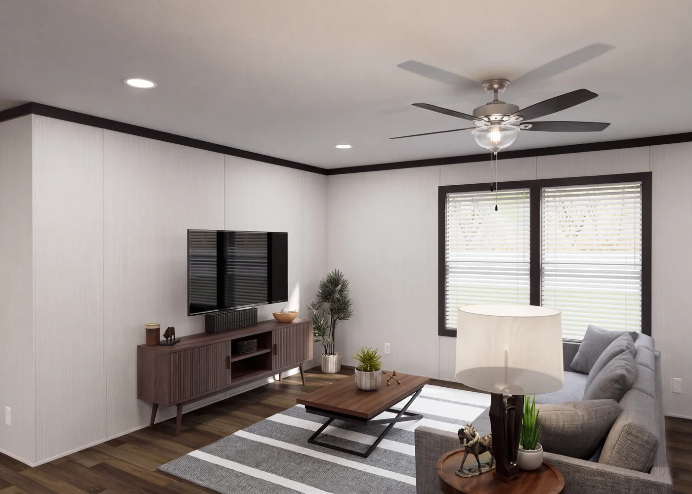 The THE FUSION 32H Living Room. This Manufactured Mobile Home features 5 bedrooms and 3 baths.