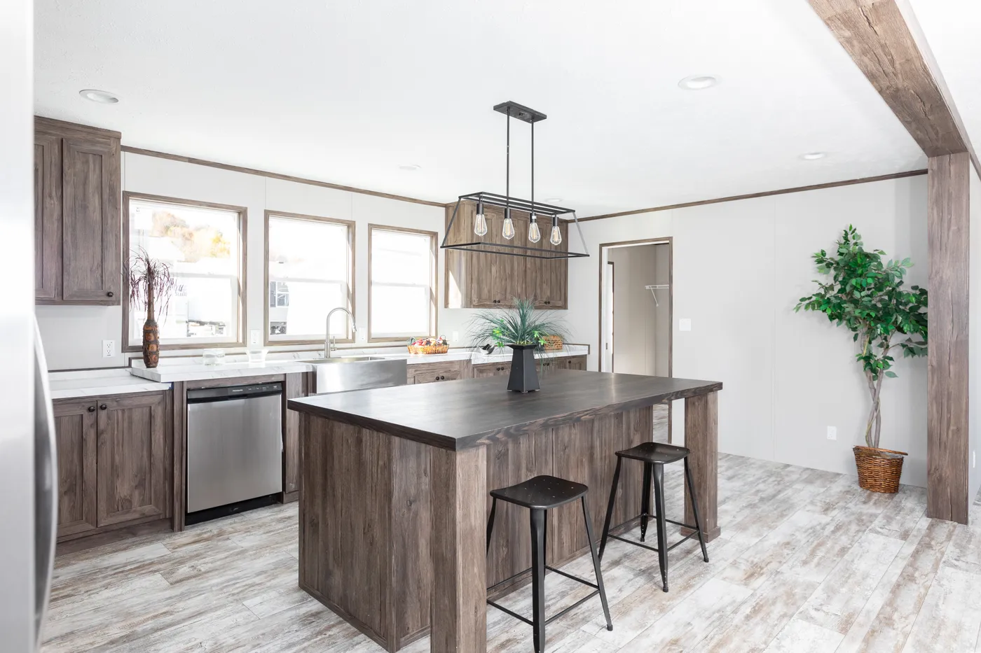 The LEWIS Kitchen. This Manufactured Mobile Home features 3 bedrooms and 2 baths.