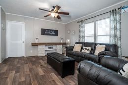 The TRADITION 72 Family Room. This Manufactured Mobile Home features 4 bedrooms and 2 baths.