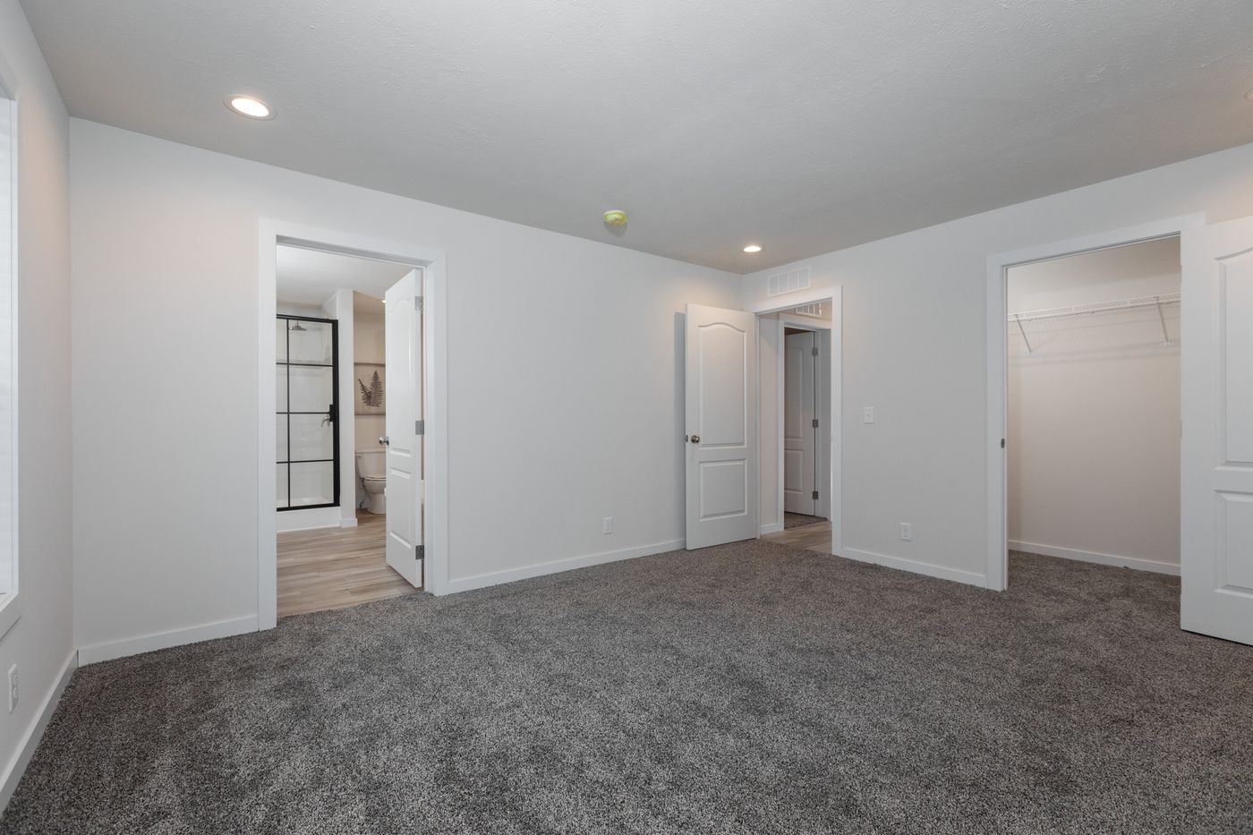 The CENTER ST/5228-MS014-1 SECT Primary Bedroom. This Manufactured Mobile Home features 3 bedrooms and 2 baths.