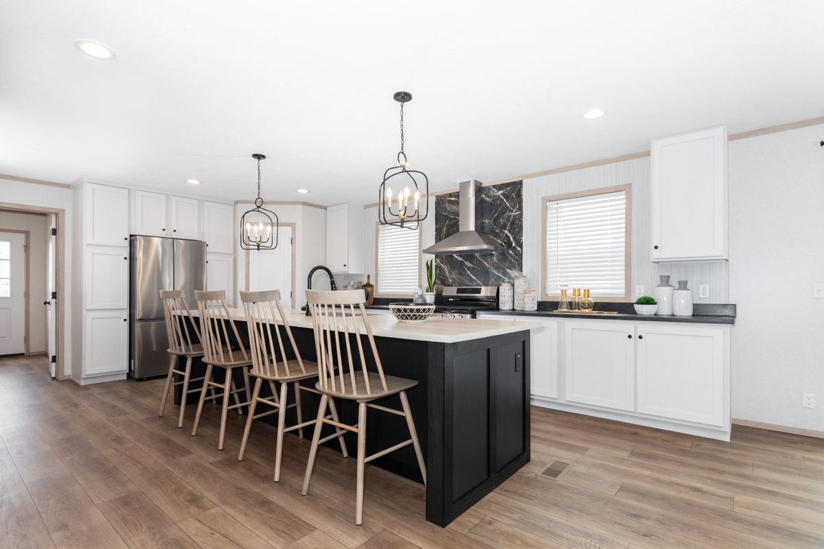 The 6032-5700 THE PULSE Kitchen. This Manufactured Mobile Home features 3 bedrooms and 2 baths.