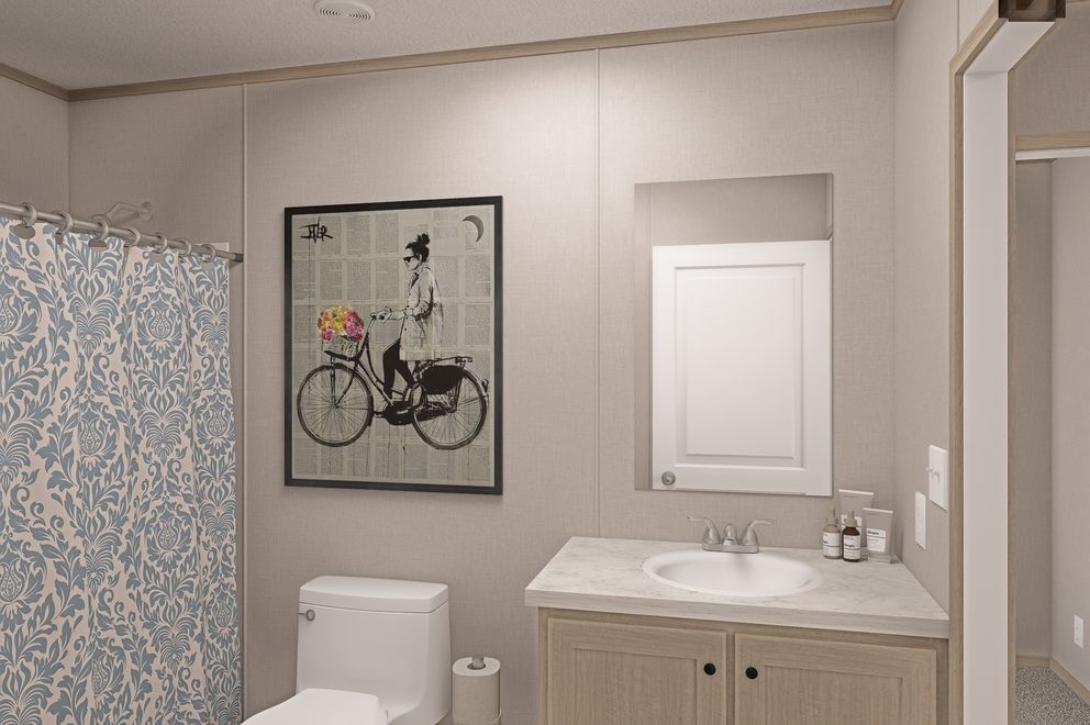 The THE EAGLE 68 Guest Bathroom. This Manufactured Mobile Home features 4 bedrooms and 2 baths.
