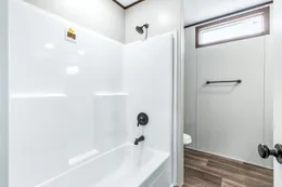 The ABSOLUTE VALUE Guest Bathroom. This Manufactured Mobile Home features 4 bedrooms and 2 baths.