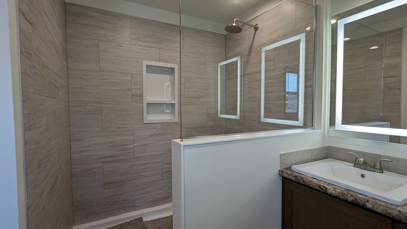 The LEGEND 327-1 Primary Bathroom. This Manufactured Mobile Home features 3 bedrooms and 2 baths.