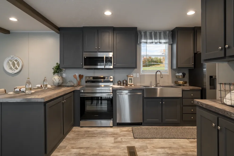 The ANNIVERSARY CHOICE Exterior. This Manufactured Mobile Home features 3 bedrooms and 2 baths.