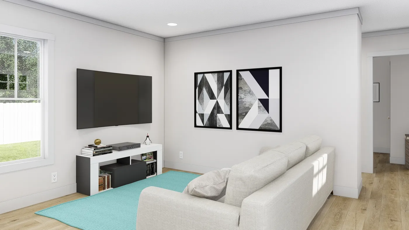 The STILL THE ONE Living Room. This Manufactured Mobile Home features 2 bedrooms and 2 baths.