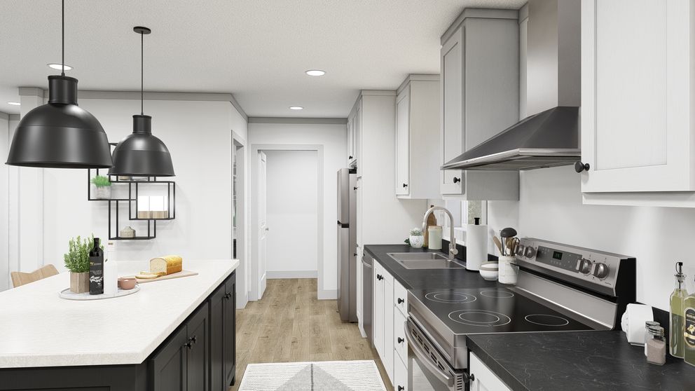 The WONDERFUL WORLD Kitchen. This Manufactured Mobile Home features 3 bedrooms and 2 baths.