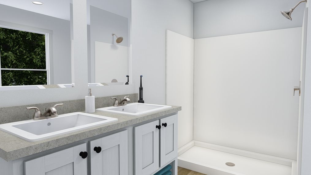 The CMH TEM2448-3A HERE COME T SUN Primary Bathroom. This Manufactured Mobile Home features 3 bedrooms and 2 baths.