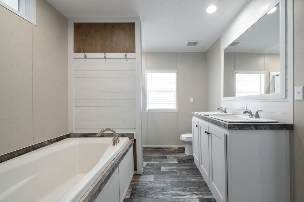 The WILLOW Primary Bathroom. This Manufactured Mobile Home features 3 bedrooms and 2 baths.