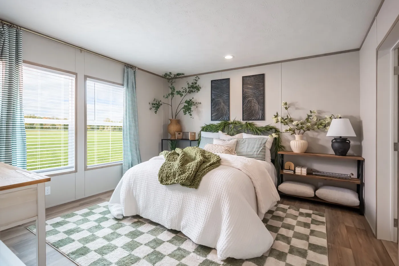 The VISTA Primary Bedroom. This Manufactured Mobile Home features 3 bedrooms and 2 baths.