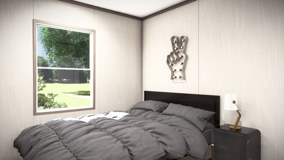 The ULTRA PRO 3 BR 28X60 Bedroom. This Manufactured Mobile Home features 3 bedrooms and 2 baths.