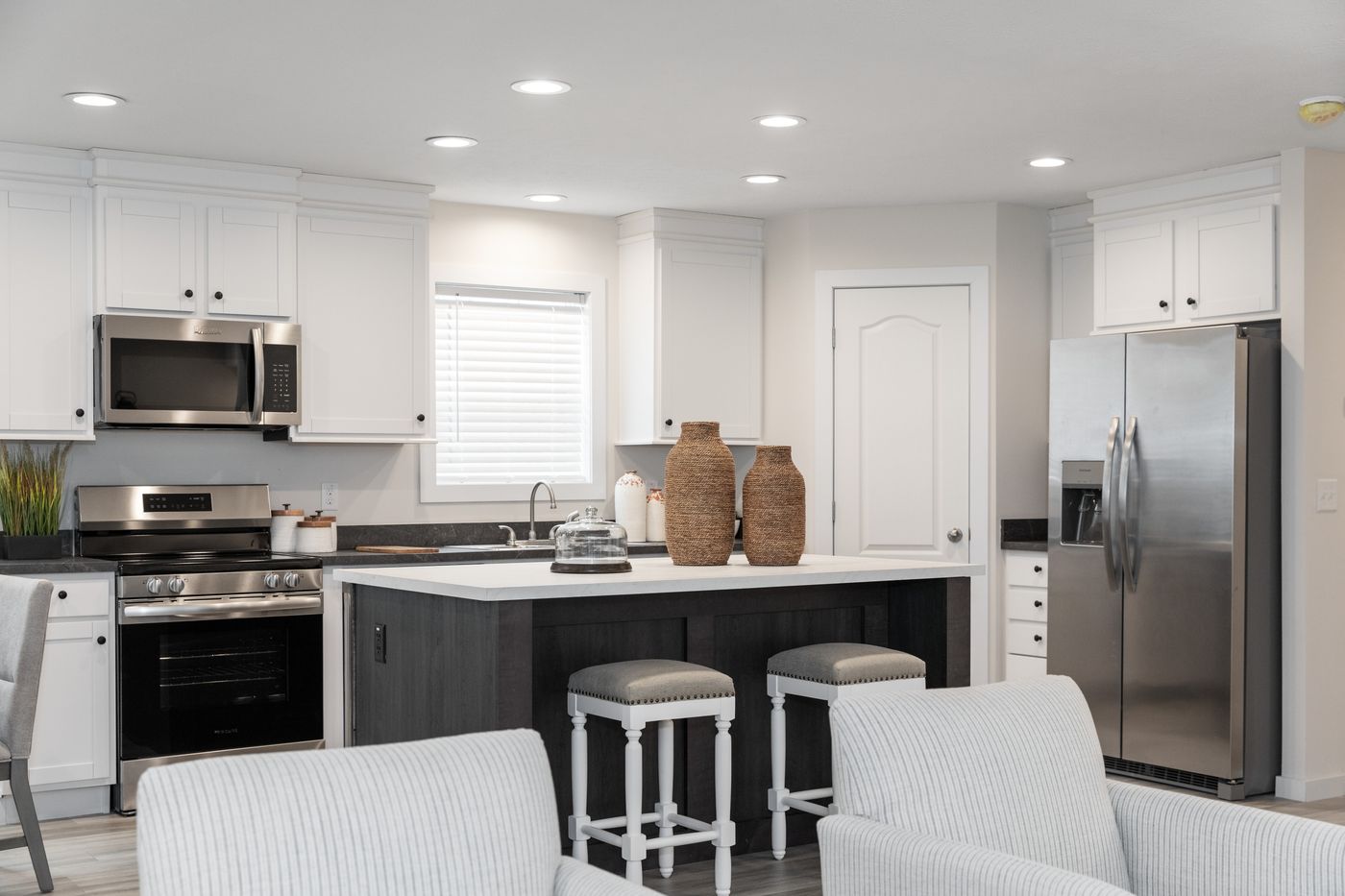 The CENTER ST/5228-MS014-1 SECT Kitchen. This Manufactured Mobile Home features 3 bedrooms and 2 baths.