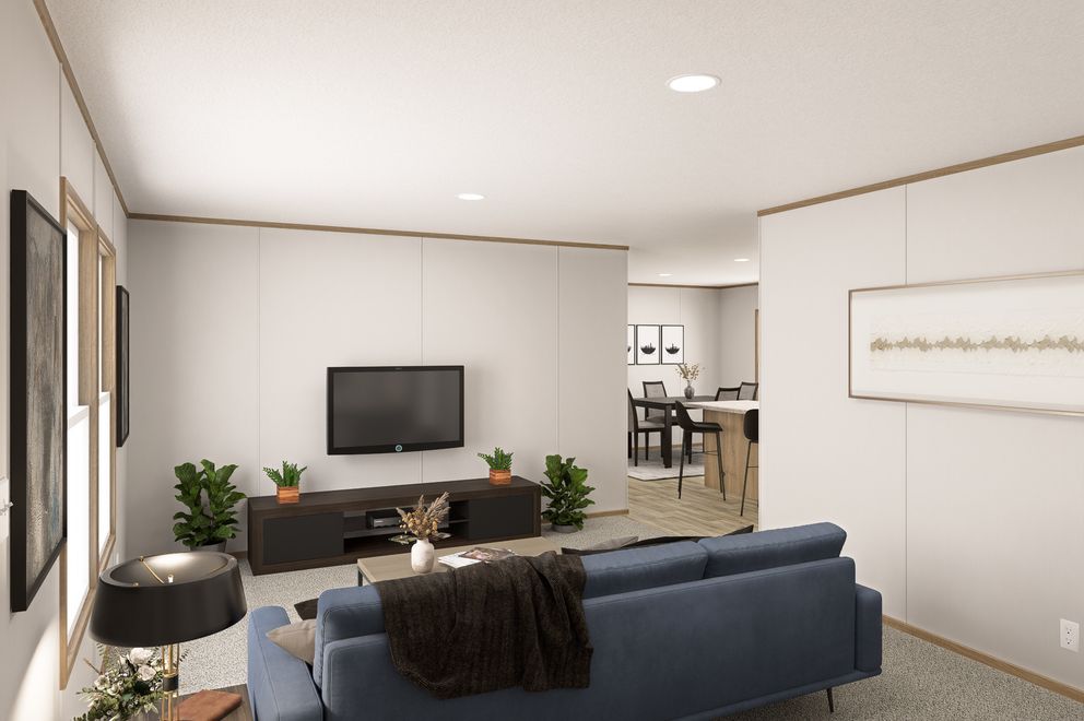 The THE EAGLE 60 Living Room. This Manufactured Mobile Home features 3 bedrooms and 2 baths.