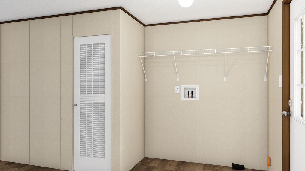 The THRILL Utility Room. This Manufactured Mobile Home features 3 bedrooms and 2 baths.