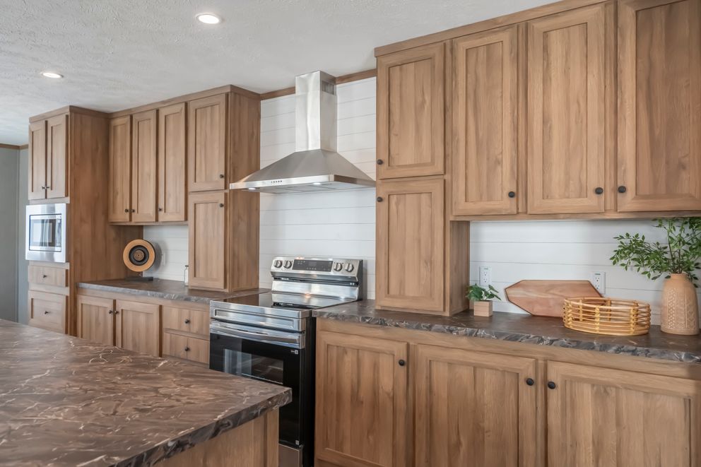 The BLACK DIAMOND Kitchen. This Manufactured Mobile Home features 3 bedrooms and 2 baths.