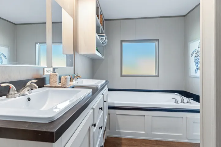 The RESOLUTION 16763X Primary Bathroom. This Manufactured Mobile Home features 3 bedrooms and 2 baths.