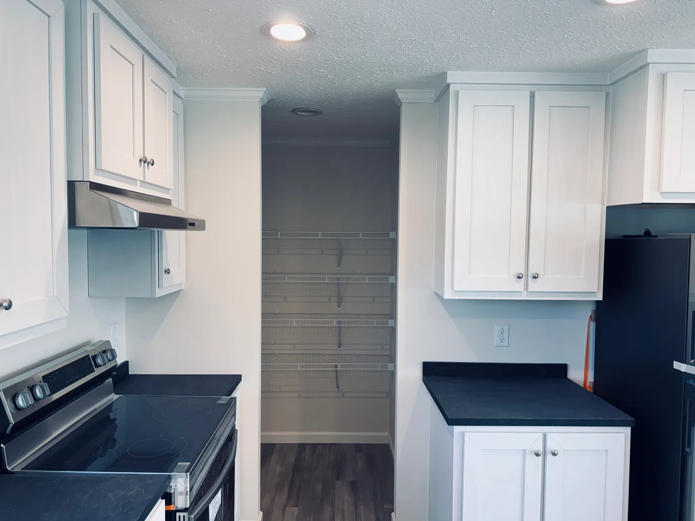 The TOURMALINE 7628-649 Kitchen. This Manufactured Mobile Home features 4 bedrooms and 2 baths.