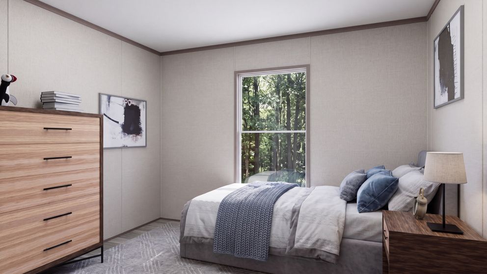 The THE MOUNTAINEER 60 Bedroom. This Manufactured Mobile Home features 3 bedrooms and 2 baths.
