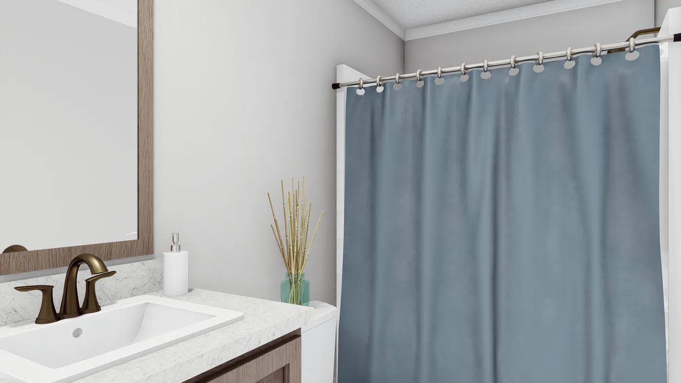 The THE SOUTHERN CHARM Guest Bathroom. This Manufactured Mobile Home features 3 bedrooms and 2 baths.