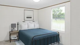 The GRAND Guest Bedroom. This Manufactured Mobile Home features 4 bedrooms and 2 baths.