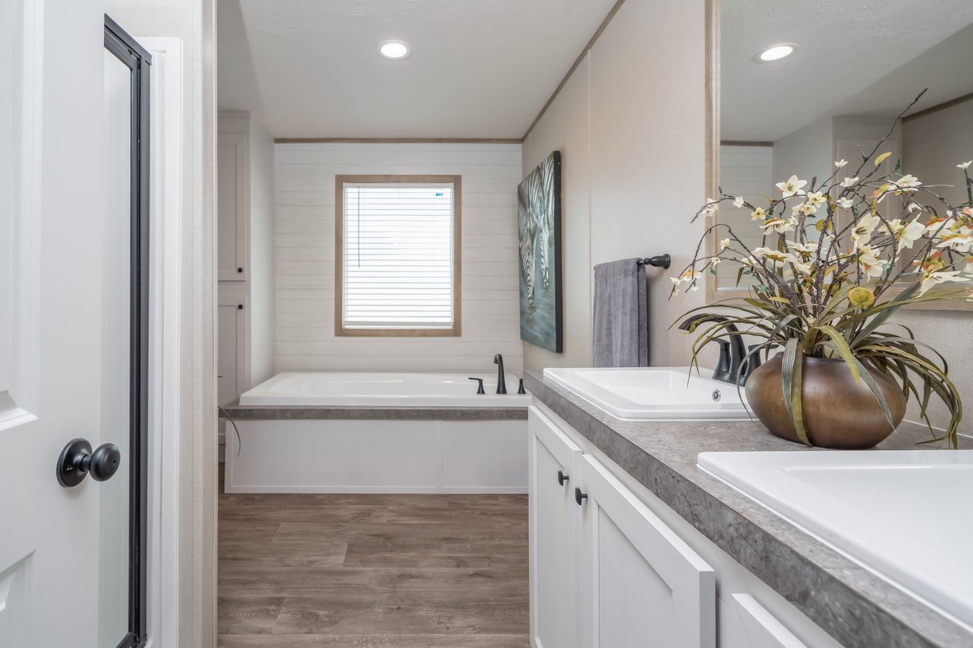 The PT 78 Primary Bathroom. This Manufactured Mobile Home features 3 bedrooms and 2 baths.