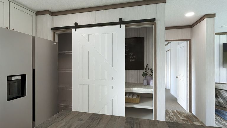 The ULTRA ISLAND BREEZE 56' Kitchen. This Manufactured Mobile Home features 3 bedrooms and 2 baths.