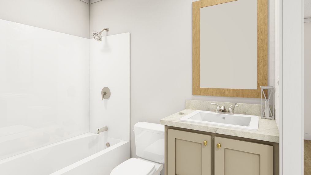 The WALK THE LINE Guest Bathroom. This Manufactured Mobile Home features 3 bedrooms and 2 baths.