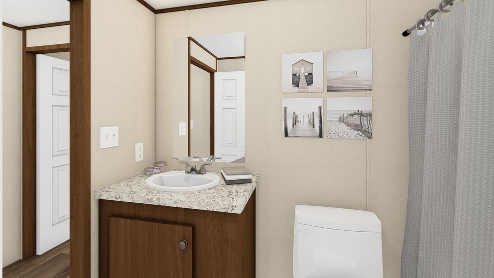 The MARVELOUS 3 Guest Bathroom. This Manufactured Mobile Home features 3 bedrooms and 2 baths.
