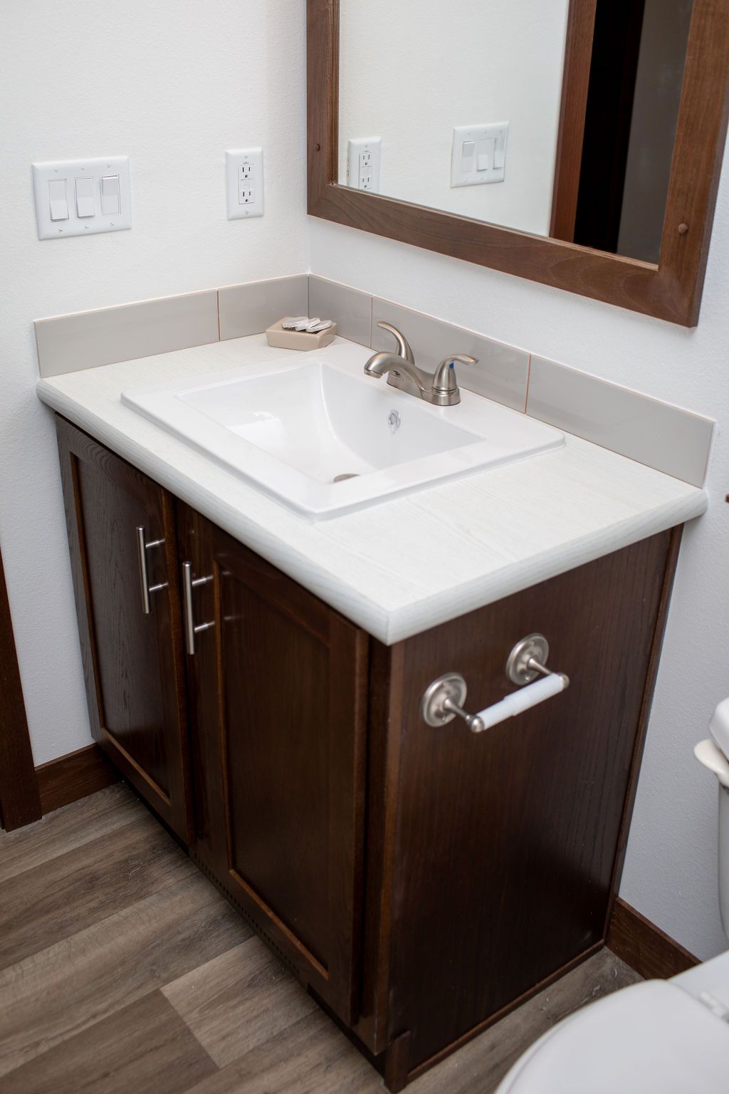 The LEGEND 76-4 Primary Bathroom. This Manufactured Mobile Home features 3 bedrooms and 2 baths.