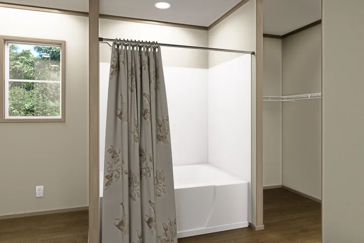 The SUMMIT Primary Bathroom. This Manufactured Mobile Home features 4 bedrooms and 3 baths.