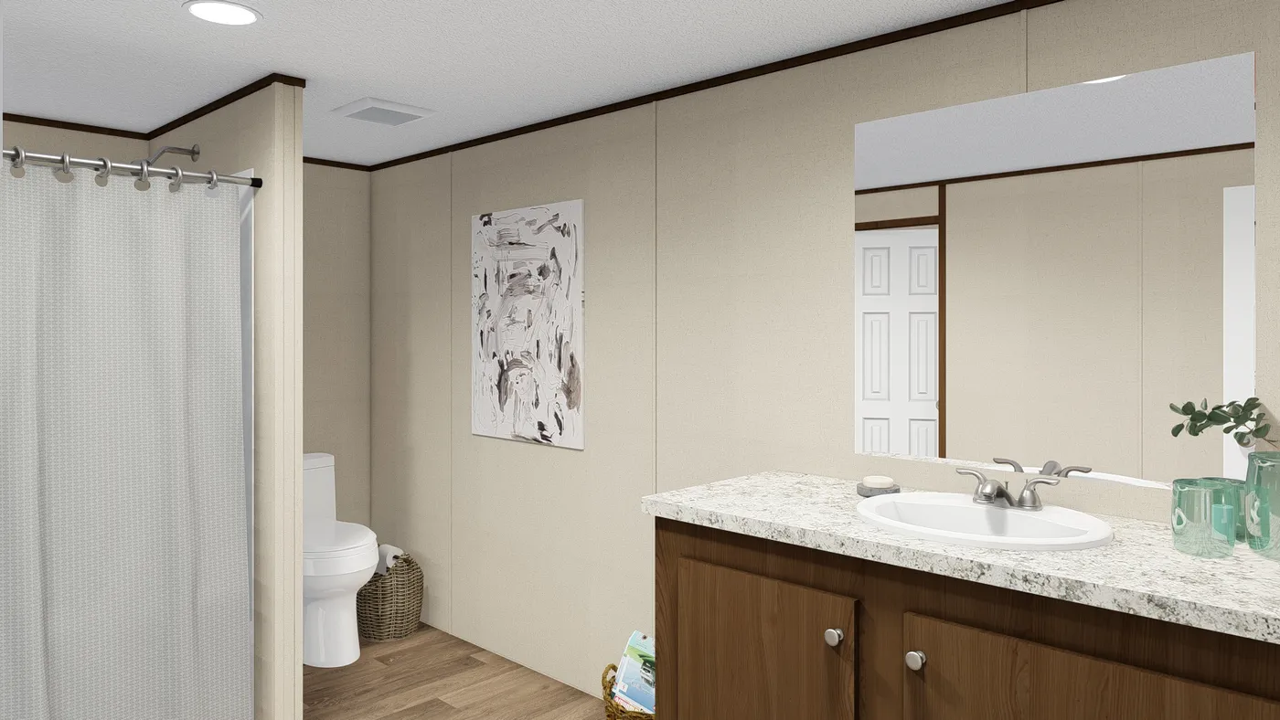 The THRILL Guest Bathroom. This Manufactured Mobile Home features 3 bedrooms and 2 baths.