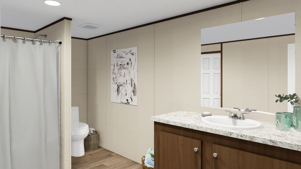The THRILL Guest Bathroom. This Manufactured Mobile Home features 3 bedrooms and 2 baths.