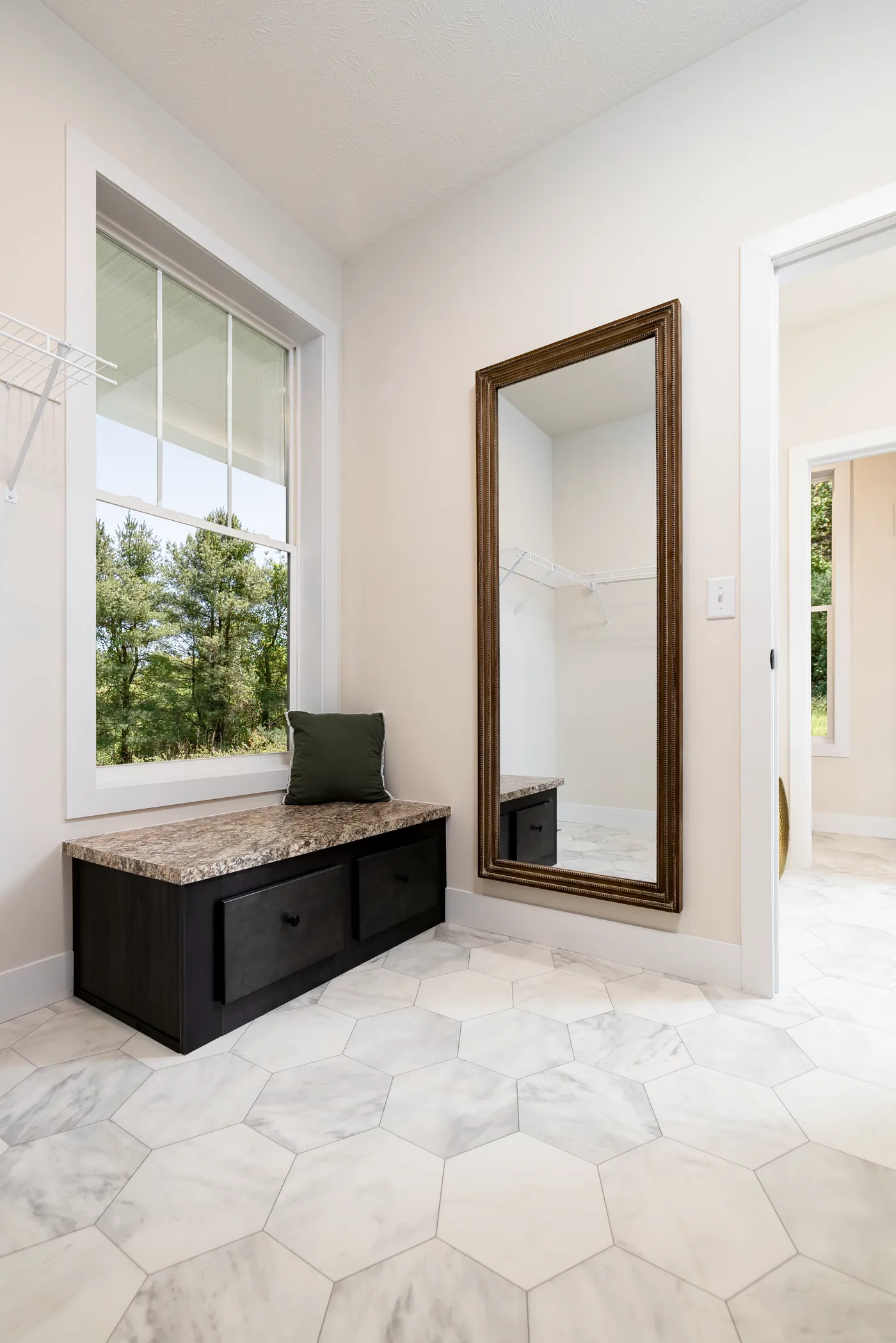 The MCCANN BLVD 6830-MS070 SECT Primary Bedroom. This Manufactured Mobile Home features 3 bedrooms and 2 baths.