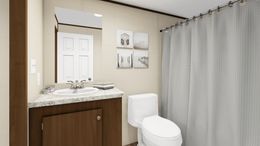 The PRIDE Guest Bathroom. This Manufactured Mobile Home features 4 bedrooms and 2 baths.